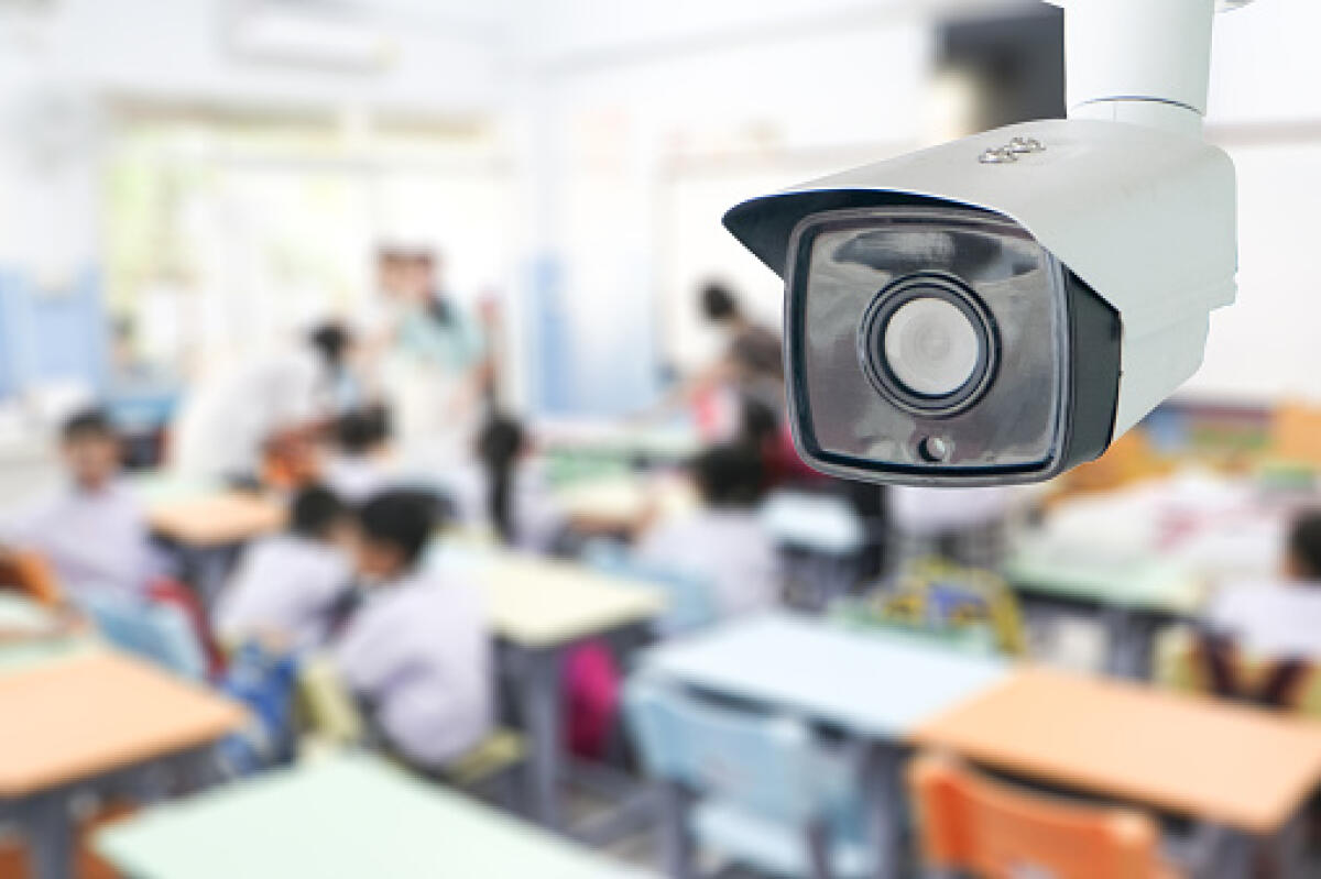 Culpa in vigilando| Responsabilità civile e penale dei docenti, la presenza fisica non è sufficiente - CCTV Security monitoring student in classroom at school.Security camera surveillance for watching and protect group of children while studying.