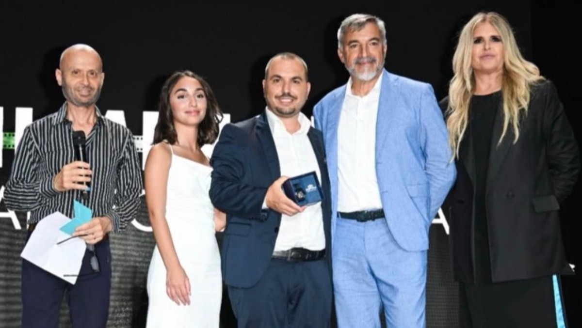 Filming Italy Sardegna Festival 2026: il Premio Festina celebra il tempo e l'educazione con Parole per domani - Cagliari, Filming Italy Sardegna Festival 2026 - premiazione. Nella foto: Massimo Arcangeli, Martina Palma, Diego Palma, Paolo Galimberti, Tiziana Rocca
