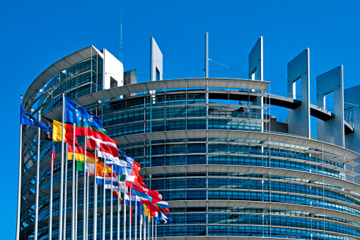 Immissioni personale Ata: tabella irricevibile per Marcello Pacifico (Anief) - The European Parliament building in Strasbourg, France with flags waving calmly celebrating peace of the Europe. July 12, 2020.
